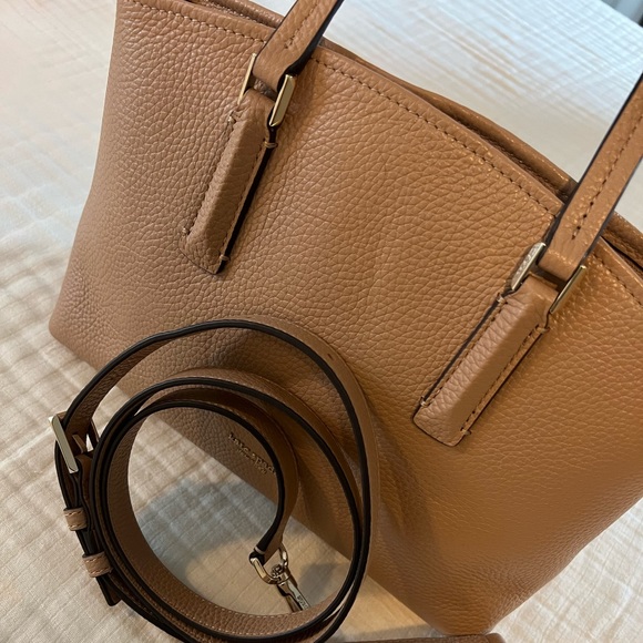 Kate Spade satchel with crossbody strap between a cream and tan color - Picture 1 of 4